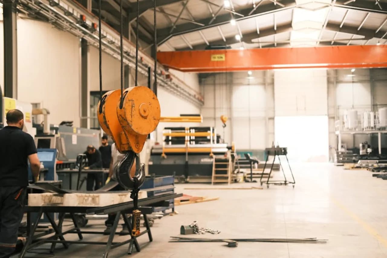 Heavy-duty overhead industrial commercial door open at a Canadian manufacturing plant